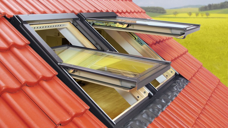 Carrollwood residential roof slope with dual impact-rated venting roof skylights
