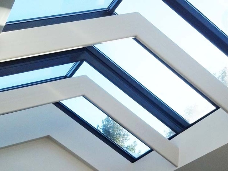 Architectural steel and glass skylight installation delivering daylight into modern Tampa building